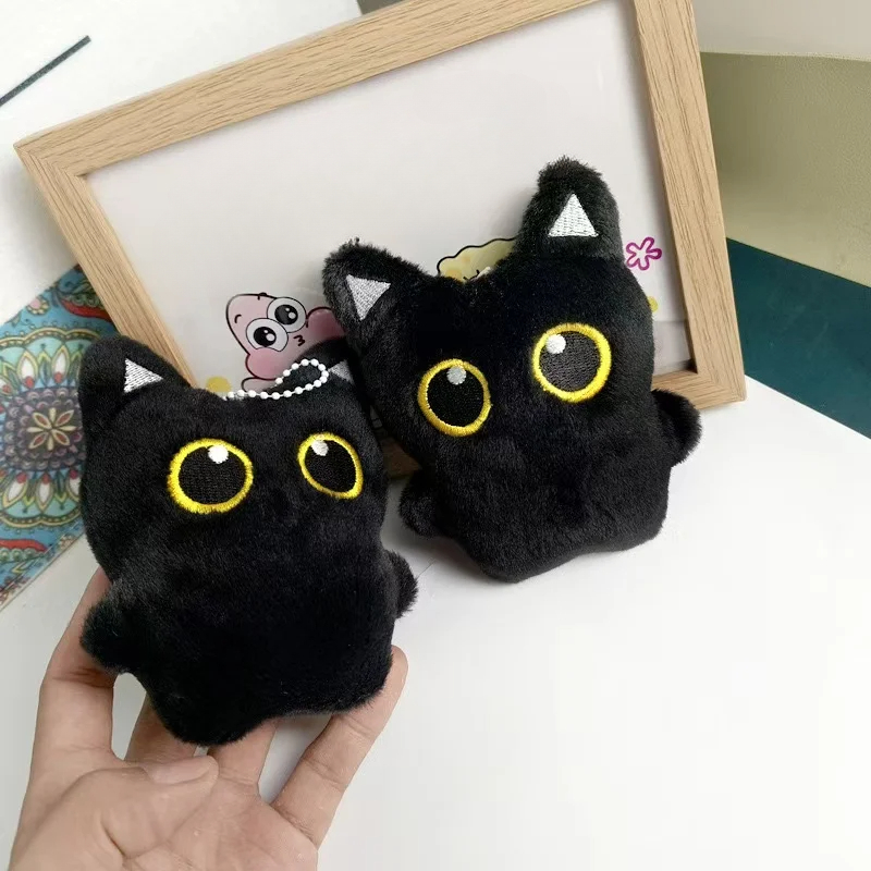 Cute plush toy of a black cat, - Photography Rules ulasan dan harga