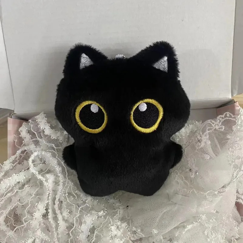 Cute plush toy of a black cat, - Photography Rules ulasan dan harga